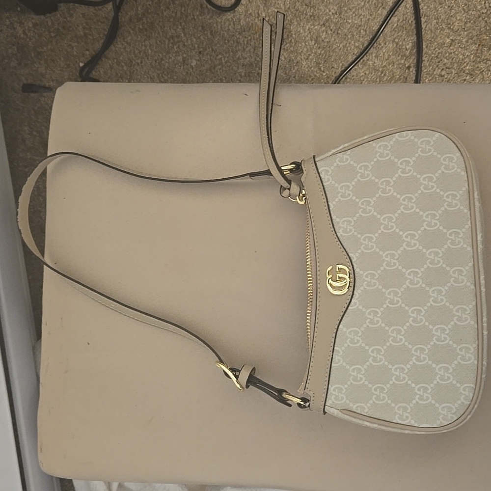 Beige and gold Gucci